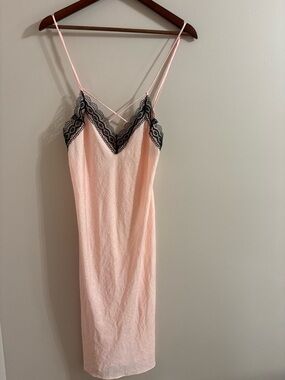 Delicate Light Pink Lace-Trim Slip with Black Accent